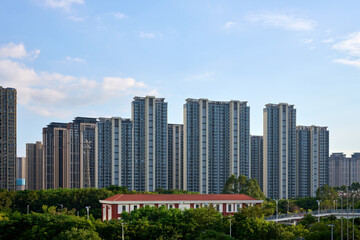 Fototapeta premium High-Rise Apartments with Blue Sky Background 