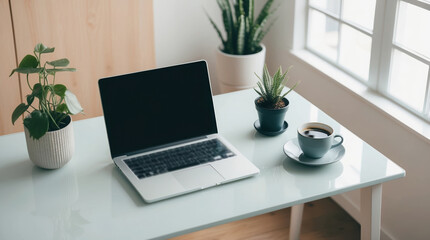 Modern workspace featuring laptop, coffee cup, and decorative plants. Bright, minimalistic design with natural light streaming through window.