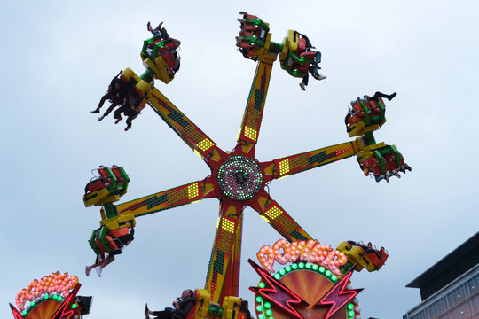 Spinning ride in motion at the carnival