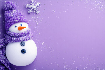 Obraz premium A snowman with a purple hat and scarf is standing on a purple background. The snowman is a cute