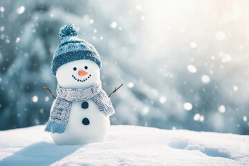 Obraz premium A snowman with a blue hat and scarf is standing in the snow. The snowman has a happy expression on its face, and the blue hat and scarf add a cheerful touch to the scene