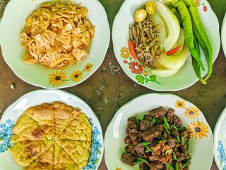 A collection of foods served on the Kalimantan dinner table