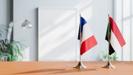 FLAGS OF FRANCE AND SUDAN ON TABLE