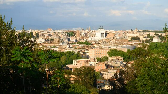 City of Rome at sunset in Italy, cityscape from Janiculum Hill (Gianicolo), panning view panorama
