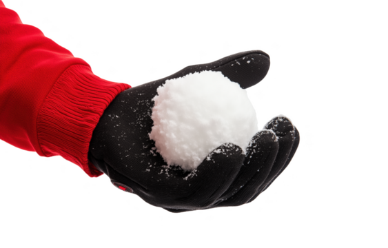A gloved hand prepares to throw a snowball during winter outdoor fun