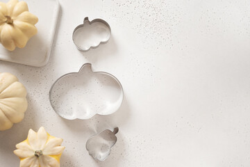 Preparation and cook autumn Thanksgiving Day cookies, cookie cutters on baking white background....