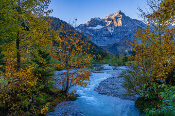 mountain river in autumn in the alps of austria