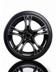 Obraz premium black car wheel isolated on white background