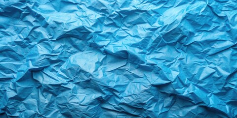 Obraz premium Crumpled blue paper wall texture abstract art created with technology