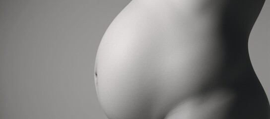 Close-up of a distended abdomen on an overweight woman