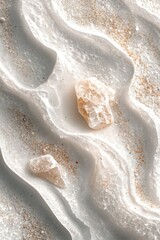 Obraz premium Textured sand patterns with crystals on a serene beach at sunset reflecting gentle waves and calming atmosphere