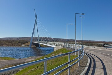 View of modern Tana bridge in clear summer weather, Tana Bru, Norway.