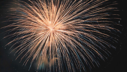 Naklejka premium Closeup of Golden Fireworks Display Illuminating the Night Sky in Celebration, with Burst of Bright Lights and Sparkling Trails against Dark Backdrop - Bonfire night, new Year Celebrations