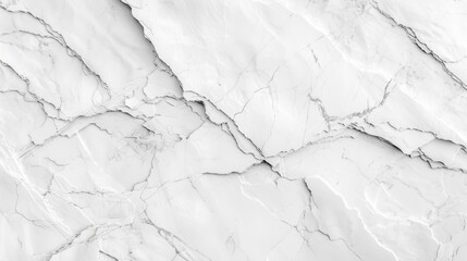 Fototapeta premium White marble wall with cracks and holes. The wall is very large and has a rough texture