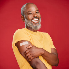 Black man, plaster and vaccination for healthcare in portrait, injection and studio background....