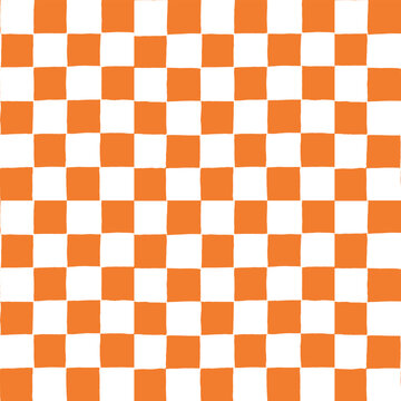 Seamless vector repeating pattern with small ditsy hand drawn checkerboard in orange and white. Halloween, harvest, fall, autumn checker background for packaging, paper, fabric, wallpaper.