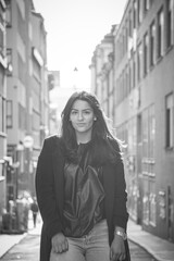 Fototapeta premium Portrait of a beautiful woman in the city