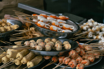 Close-up photo of food at a food street stall in Jalan Alor Food Street, Kuala Lumpur, Malaysia.