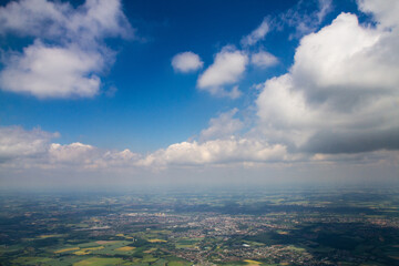 beautiful thick clouds in the sky from the height of the flight of the plane with a view of the...