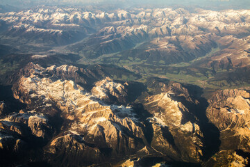 beautiful mountain landscape on high rocks from the height of the flight of the plane