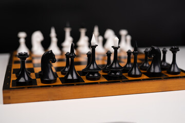 beautiful playing chess on the chessboard before the game