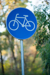 Bicycle Traffic Sign on Forest Pathway in Autumn Setting