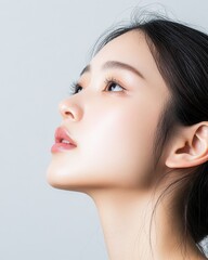 Fototapeta premium Elegant Side Profile of Asian Model Woman
