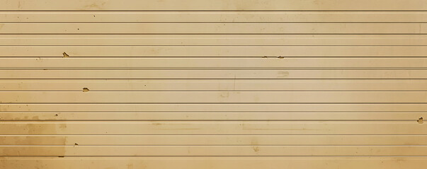 Obraz premium A textured beige cardboard background featuring horizontal stripes and subtle scratches, providing a rustic, vintage feel suitable for backgrounds or design projects.