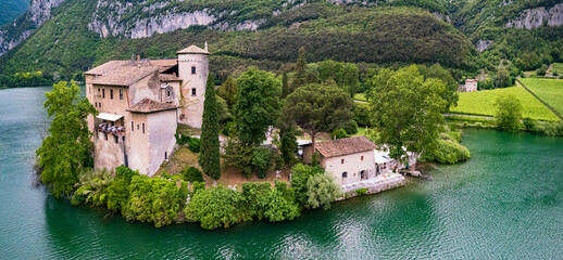 Beautiful Toblino lake is considered one of the most romantic lakes in the Trentino, Italy. aerial...