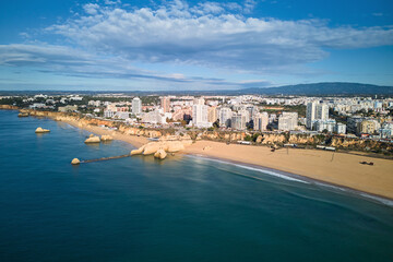 Aerial view of Portimao city and its famous beach Praia Da Rocha  in autumn, Portugal