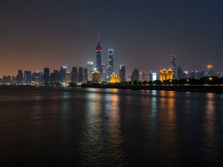 Naklejka premium Yangtze River with Wuhan's modern skyline in the background.