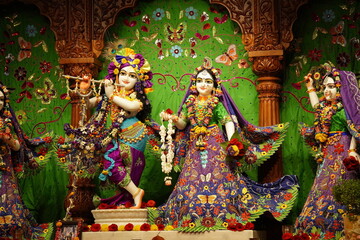 god krishna and radha in traditional vibrant attire