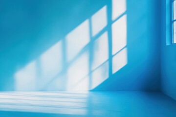 Gentle light blue background perfect for highlighting products with soft shadows created by natural light streaming through windows