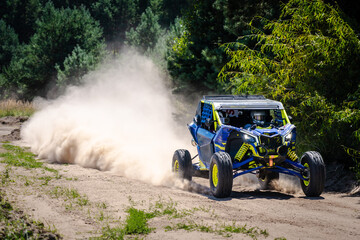 Outdoor activities UTV buggy on dusty track. 4x4, extreme, adrenalin