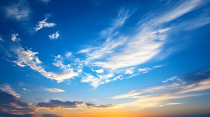 Fototapeta premium A vibrant sky at sunset with clouds and a gradient of colors.