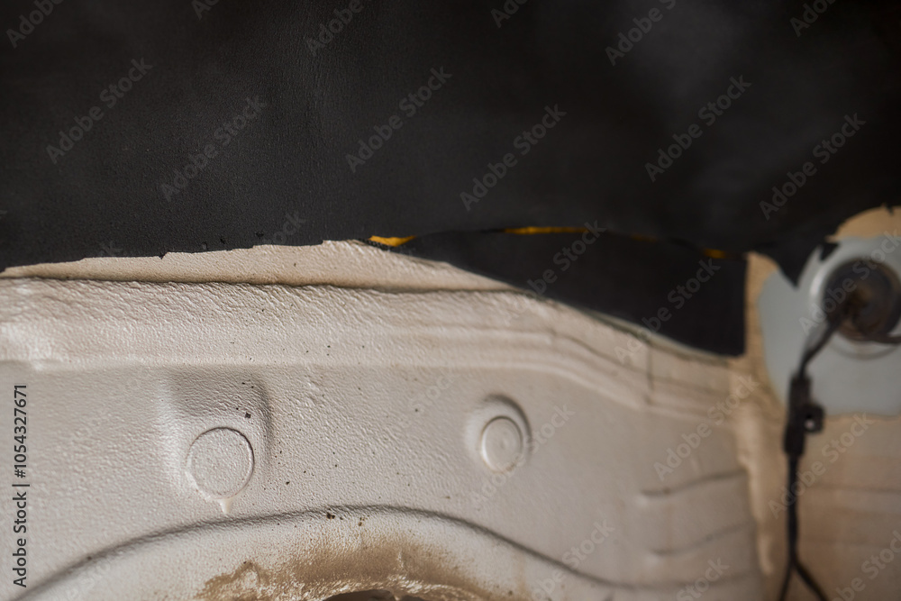 Poster applying a protective coating with a roller tool in various automotive work projects and techniques