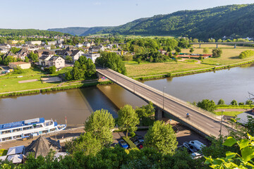Obraz premium Cityscape of Saarburg along river Saar in the state of Rhineland-Palatinate in Germany