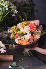 Beautiful Floral Bouquet in Florist's Hands - Flower Boutique Series