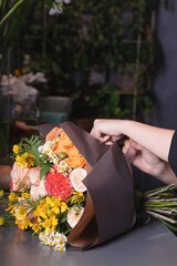 Beautiful Floral Bouquet in Florist's Hands - Flower Boutique Series