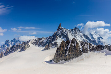 Snow covered mountains and rocky peaks of the Alps from the sky way between Chamonix and Courmayeur...