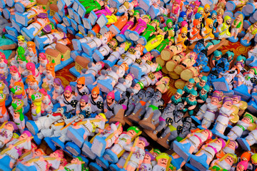 A variety of colorful statues are being sold during the Diwali Festival, India, where children make forts (Killa) in honor of the great warrior, Chhatrapati Shivaji