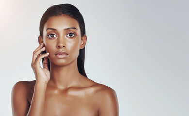 Beauty, studio and portrait of Indian woman with skincare from dermatology in mockup space. Face,...
