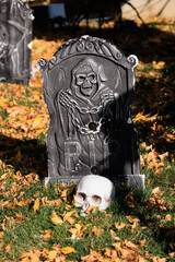 Various colorful Fall and Halloween yard and porch decorations