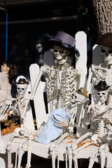 Various colorful Fall and Halloween yard and porch decorations