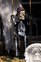 Various colorful Fall and Halloween yard and porch decorations