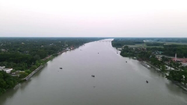 View of the river and the city. Drone view of the river and tree.