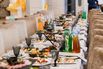 Elegant Banquet Table Setting with Assorted Dishes and Beverages