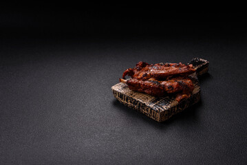 Ribs or rack of beef baked on the grill with salt, spices and herbs