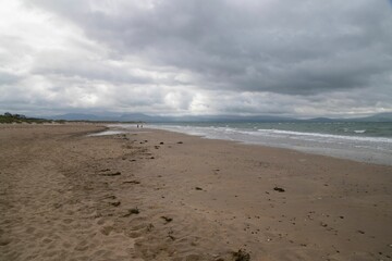 Scenic view of Newborough Beach in Wales on a cloudy day