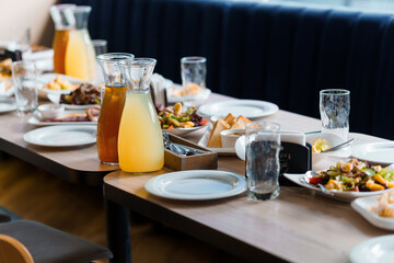 Elegant Dining Experience with a Plentiful Table Set for a Feast